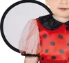 Close-up of a baby wearing a ladybug costume. Produktbild-Vorschau
