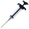A close-up studio shot of a marinade injector syringe against a white background. Náhled obrázku produktu