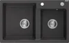 A top-down view of a black granite double kitchen sink with chrome drains and faucet holes.
