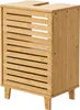 A wooden cabinet with slatted doors and four legs. Podgląd zdjęcia produktu
