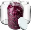 Three empty glass jars and one jar filled with chopped red cabbage, with a white lid in the foreground. Podgląd zdjęcia produktu