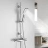 A chrome shower set mounted on a white wall, with water spraying from the showerhead. Anteprima dell’immagine prodotto