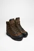 A pair of brown trekking boots with black soles and laces, displayed on a white background. Náhľad obrázku produktu
