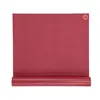 A rolled-up yoga mat on a white background. Produktbild-Vorschau