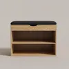 A shoe cabinet with a padded seat on top, against a plain background. Podgląd zdjęcia produktu