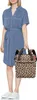 A woman is standing and holding a leopard print backpack. Podgląd zdjęcia produktu