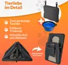 A marketing image showcasing features of a dog transport box, including its accessories and storage. Produktbild-Vorschau