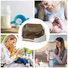 Collage showing a baby bottle drying rack and people interacting with babies. Produktbild-Vorschau