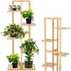 Two wooden plant stands are shown against a white background. The stand on the left is filled with several potted plants, while the stand on the right is empty. Náhľad obrázku produktu