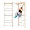 A woman is performing an exercise on a wooden wall-mounted fitness ladder with a pull-up bar. Produktbild-Vorschau