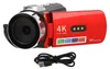 A red and black camcorder with a USB cable in front of a white background. Podgląd zdjęcia produktu