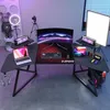 A gaming desk setup with a computer, laptop, gaming accessories, and lighting. Produktbild-Vorschau