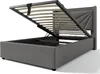 A grey upholstered bed frame with the mattress support mechanism lifted to reveal the storage compartment underneath. Produktbild-Vorschau
