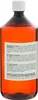 A close-up of a bottle of amber-colored oil with text on the label. Produktbild-Vorschau