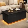 A modern black coffee table with LED lighting is shown in a living room setting with a sectional sofa. Anteprima dell’immagine prodotto