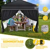 A family is enjoying a meal under a black pop-up gazebo in a garden. Náhľad obrázku produktu