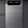 A stainless steel built-in dishwasher with a digital display and controls. Produktbild-Vorschau
