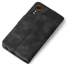 A black flip case for a smartphone is shown on a white background. Produktbild-Vorschau