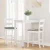 A white bar table with two white bar stools with gray cushions, set against a bright window. Náhľad obrázku produktu