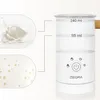 A product shot of a milk frother with illustrative insets showing milk splashing and frothed milk. Produktbild-Vorschau