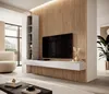 A modern living room with a wall-mounted TV and shelving unit. Náhled obrázku produktu