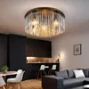 A modern dining and living area with a kitchen island and sectional sofa. Produktbild-Vorschau
