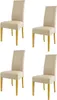 Four beige upholstered dining chairs with light brown wooden legs are arranged in a grid against a white background. Produktbild-Vorschau
