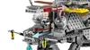 A close-up view of a LEGO Star Wars AT-TE walker with a minifigure pilot. Podgląd zdjęcia produktu
