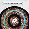 A close-up view of roasted coffee beans arranged in concentric circles, with a stylized coffee bean icon in the center. Text overlays are present. Produktbild-Vorschau