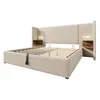 A bed frame with a headboard and integrated nightstands, shown from a diagonal angle. Anteprima dell’immagine prodotto