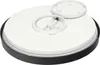 The underside of a round LED ceiling light with a black outer ring and a white inner surface. A small white cap is placed next to a central opening. Náhľad obrázku produktu
