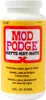 A close-up studio shot of a bottle of Mod Podge Matte. Produktbild-Vorschau