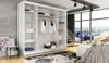 A spacious white wardrobe is shown in a modern apartment with a large window overlooking a city skyline. Produktbild-Vorschau