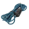 A coiled gaming headset cable with a blue and black braided pattern and an inline volume control and mute switch. Voir les images du produit