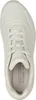 A top-down view of a beige Skechers sneaker. Voir les images du produit