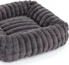A close-up, studio shot of a grey, plush dog bed with a ribbed texture. Produktbild-Vorschau
