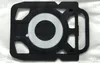 A close-up, top-down view of a black vacuum cleaner bag adapter with a white ring. Produktbild-Vorschau