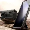 Two black phone cases with kickstands are displayed on a rocky surface with a blurred background. Produktbild-Vorschau