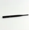A black WiFi antenna is laid out on a white background. Voir les images du produit