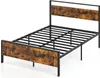 A metal bed frame with a rustic wood-look headboard and footboard, shown against a white background. Produktbild-Vorschau