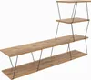 A multi-tiered wooden shelf unit with black metal legs against a white background. Produktbild-Vorschau