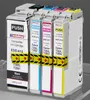 Four ink cartridges are arranged in a row, with the front cartridge slightly angled. Anteprima dell’immagine prodotto