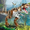 A detailed model of a Gigantosaurus dinosaur, constructed from building blocks, set against a lush prehistoric jungle backdrop with waterfalls and flying Pterodactyls. Produktbild-Vorschau