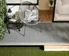 Graue Klickfliese mit Klicksystem ausgelegt auf einer Terrasse 
 Produktbild-Vorschau