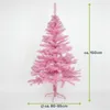 A pink artificial Christmas tree with a metal stand, shown against a white background with size indicators. Produktbild-Vorschau