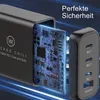 Close-up of a black USB-C charger with its internal circuitry exposed, highlighting its technology. Produktbild-Vorschau