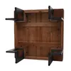 The underside of a wooden coffee table with black metal legs. Voir les images du produit