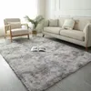 A living room scene with a sofa, armchair, and a large shaggy rug. Podgląd zdjęcia produktu