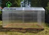 A clear, full-shot image of a polycarbonat greenhouse with a wooden base, set outdoors on grass. Produktbild-Vorschau