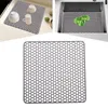 Collage of images showing a hexagonal silicone sink mat in different kitchen settings. Podgląd zdjęcia produktu